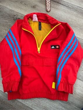 adidas Red Jacket with Blue Logo and Yellow Mesh